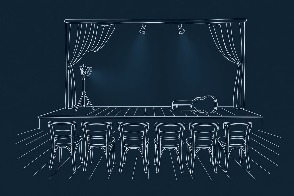 Line drawing of one short row of wooden chairs facing an empty stage with a guitar case on the boards